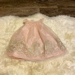12 month dress with gold embroidery, fluttered sleeves, and a layered skirt.